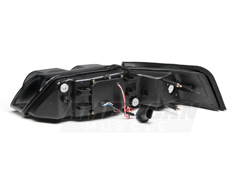 Raxiom 99-04 Ford Mustang Dual LED Halo Projector Headlights- Black Housing (Smoked Lens)