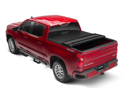 Lund 88-99 Chevy C1500 Fleetside (8ft. Bed) Hard Fold Tonneau Cover - Black