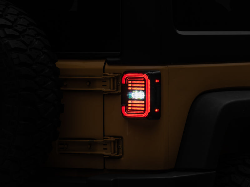 Raxiom 07-18 Jeep Wrangler JK Axial Series LED Halo Tail Lights- Black Housing (Dark Smoked Lens)